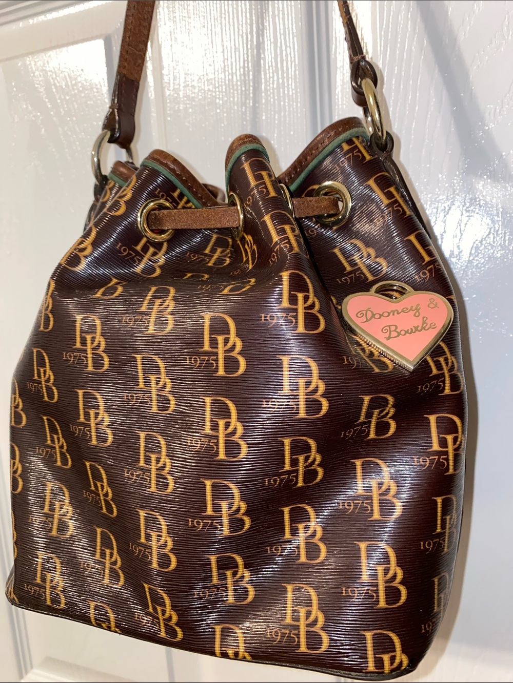 Dooney & Bourke Brown DB Monogram Braided Drawstring Bucket Bag - Picture 8 of 12